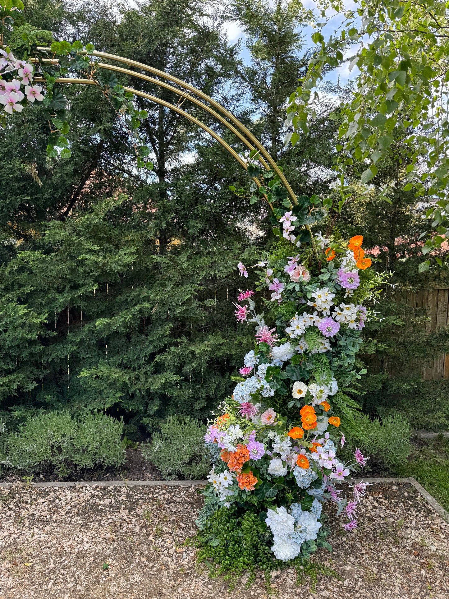 Wedding gate available for rent with the amount of flowers shown in the pictures