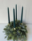 Advent wreath with snowy blue berries