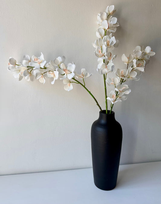 Fehér orchidea csokorban