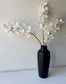 Fehér orchidea csokorban