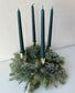 Advent wreath with snowy blue berries