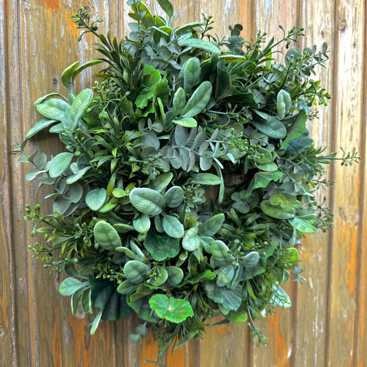 Seasonal green door decoration