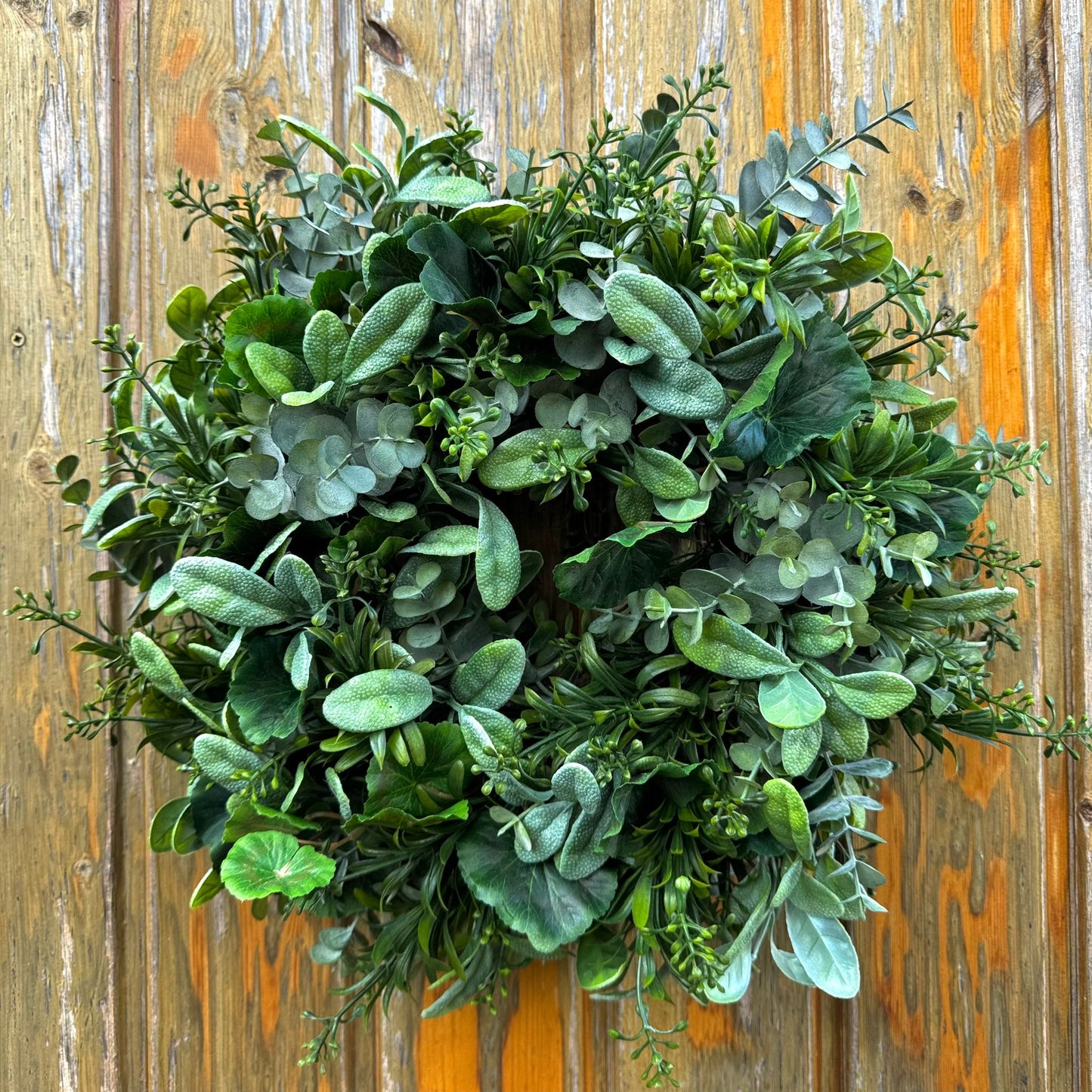 Seasonal green door decoration