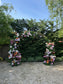 Wedding gate available for rent with the amount of flowers shown in the pictures