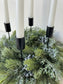 Advent wreath with snowy blue berries