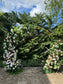 Wedding gate available for rent with the amount of flowers shown in the pictures