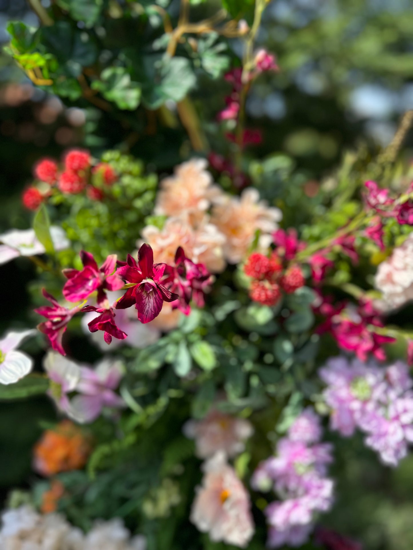 Wedding gate available for rent with the amount of flowers shown in the pictures