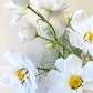 Fibrous white artificial flower