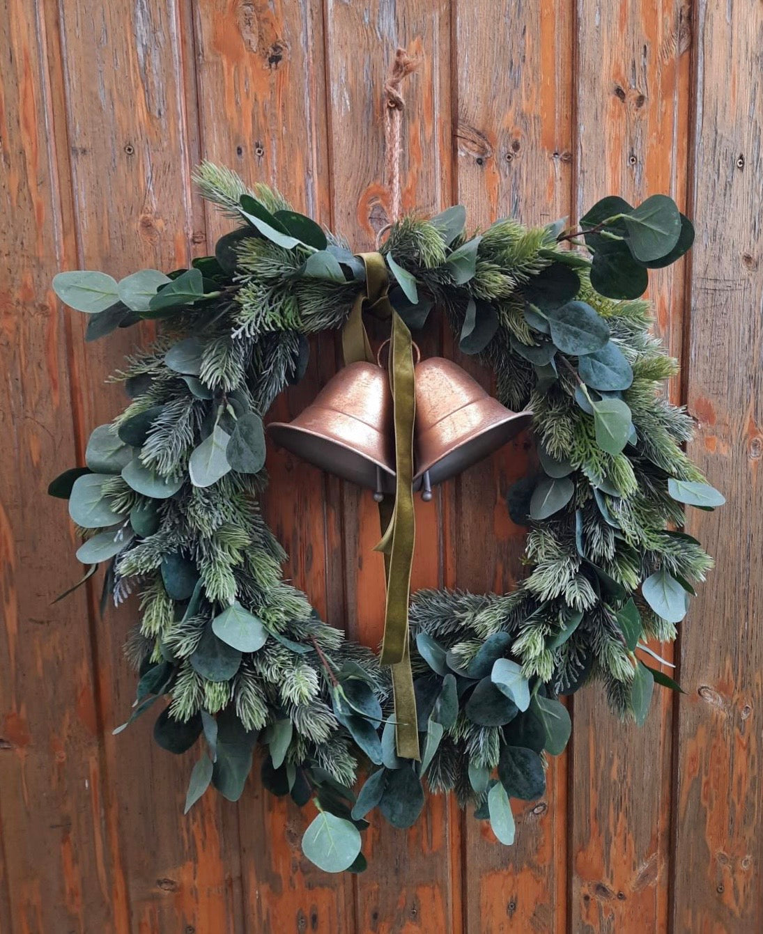 Winter door decoration with gold columns