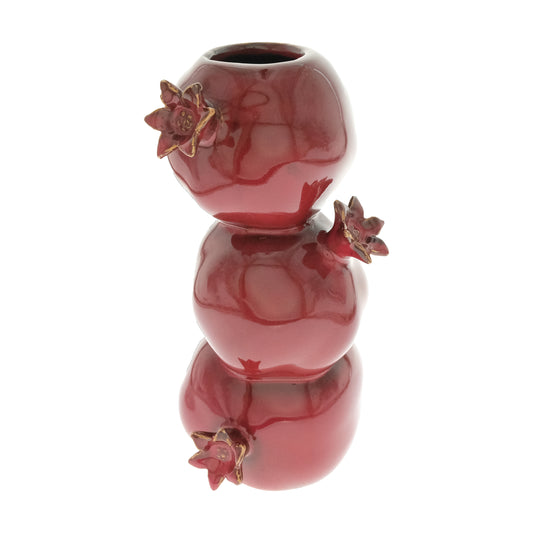 Vase with pomegranates