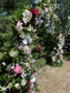 Wedding gate available for rent with the amount of flowers shown in the pictures