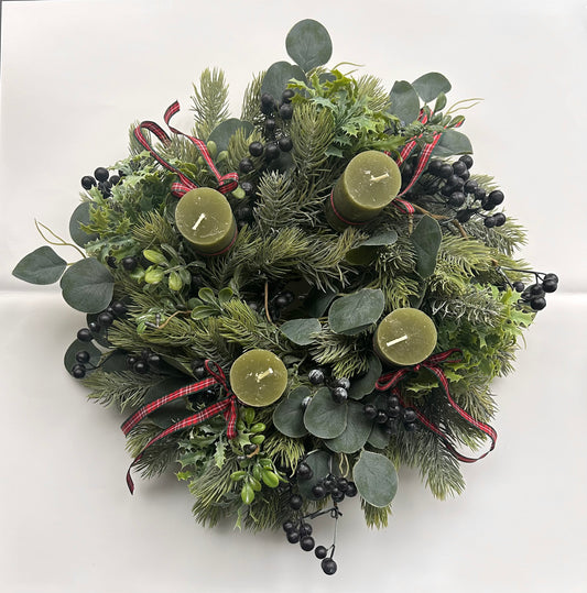 Advent wreath with blue berries