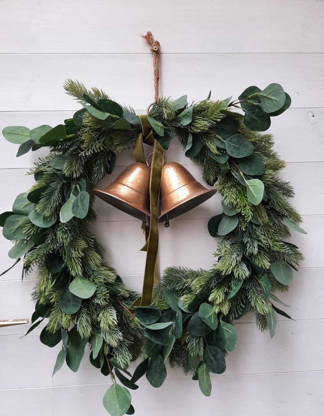 Winter door decoration with gold columns